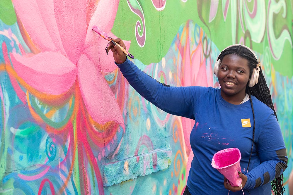 artist painting mural
